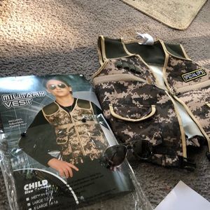Military vest and sunglasses